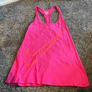 Good condition nike racer back tank. Some tiny stains, hardly noticeable. Size L
